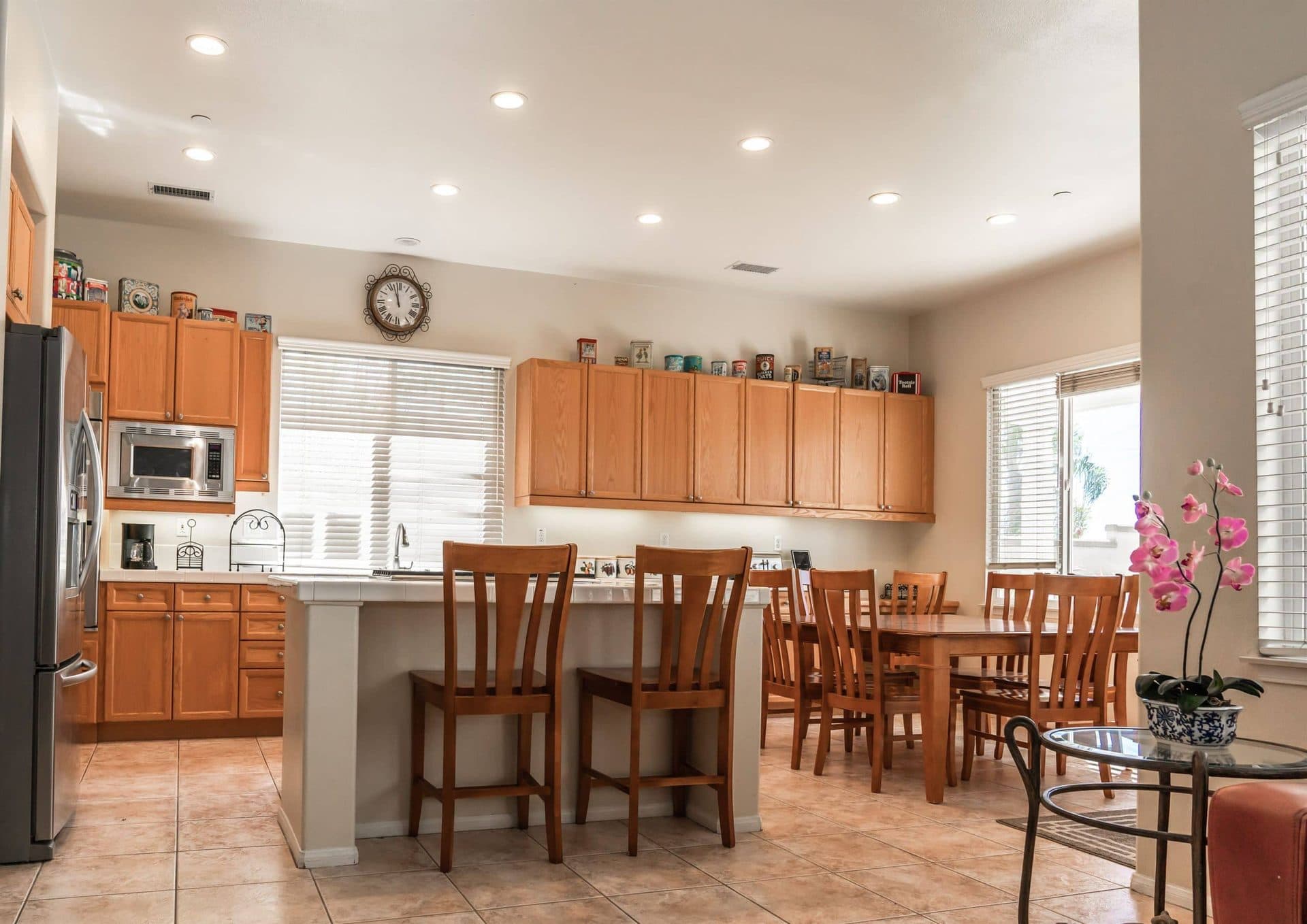 Kitchen with breakfast bar and dining seating