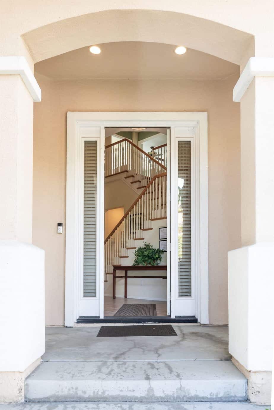 Arched entry leading to the front door