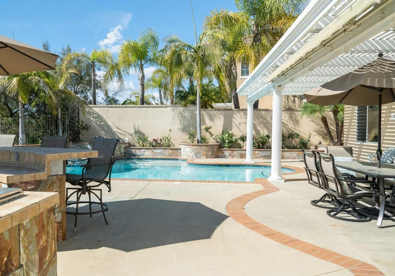 Pool, spa and covered outdoor dining area